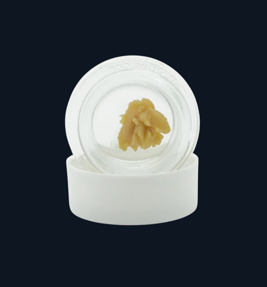 A white lid and jar with Motorbreath x Banana Punch concentrate.